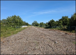 Looking towards Sheepway Bridge and Bristol from Tansy Lane crossing. All track removed. July 2026
